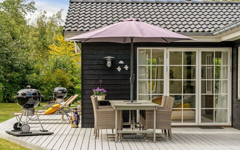 Fido - 300M from the Sea: Furniture, Outdoor Furniture, Chair, Flowerpot, Home, Garden, Outdoor Table, Door, Patio, Umbrella