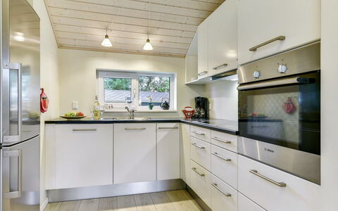 Anethe - 100M to the Fjord: Kitchen, Wood, Ceiling, Countertop, Interior Design, Flooring, Major Appliance, Kitchen Appliance, Cabinetry, Lighting