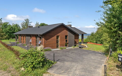 Andri - 600M to the Fjord: Wood, Roof, Architecture, Home, House, Cottage, Siding, Hardwood, Slope, Estate