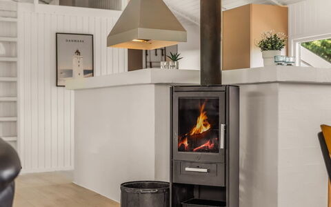 Franka - 950M from the Sea: Hearth, Wood-Burning Stove, Hardwood, Wood Stain, Living Room, Chair, Varnish, Wood Flooring, Fireplace