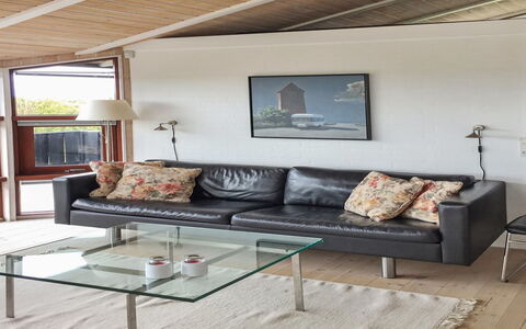 Sigvalda - 250M from the Sea: Furniture, Couch, Flooring, Wood, Interior Design, Floor, Living Room, Table, Lighting, Coffee Table