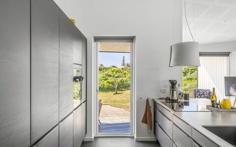 Vilda - 416M from the Sea: Kitchen, Countertop, Interior Design, Flooring, Kitchen Appliance, Furniture, Wood, Cabinetry, Major Appliance, Floor