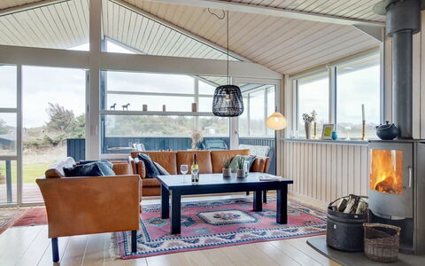Ailika - 300M from the Sea: Furniture, Interior Design, Wood, Couch, Ceiling, Flooring, Living Room, Floor, Home, Lighting