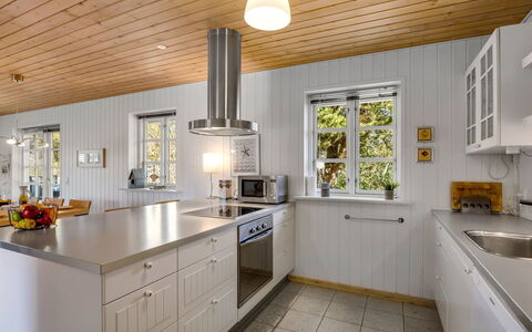 Othelia - 1.8Km from the Sea: Flooring, Wood, Interior Design, Ceiling, Kitchen, Countertop, Floor, Light Fixture, Cabinetry, Kitchen Appliance