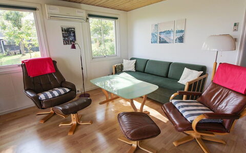 Isalie - 200M from the Sea: Furniture, Wood, Flooring, Interior Design, Floor, Living Room, Room, Chair, Wood Stain