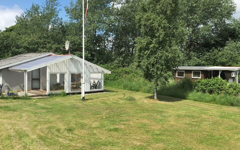 Gonda - 500M from the Sea: Roof, House, Home, Cottage, Siding, Estate, Driveway, Garden Buildings, Yard, Shed