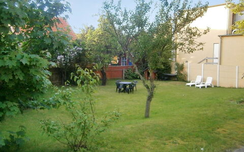 Harro - 150M from the Sea: Garden, Shrub, Lawn, Backyard, Yard, Shade, Landscaping, Chair, Outdoor Furniture, Courtyard