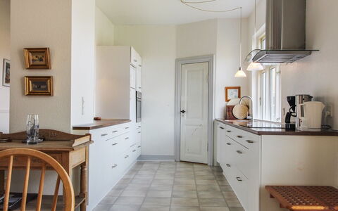 Harro - 150M from the Sea: Flooring, Interior Design, Furniture, Cabinetry, Floor, Countertop, Kitchen, Wood, Ceiling, Light Fixture