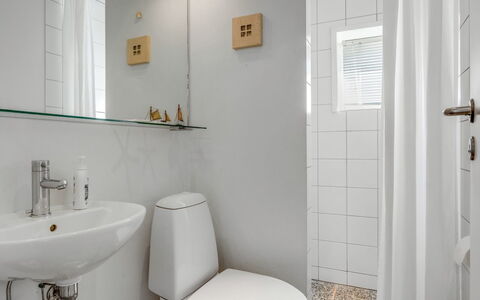 Hialmar - 400M from the Sea: Bathroom, Plumbing Fixture, Wall, Toilet Seat, Interior Design, Bathroom Sink, Flooring, Toilet, Sink, Floor