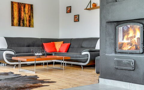 Sölve - 900M from the Sea: Furniture, Flooring, Hearth, Living Room, Wood-Burning Stove, Couch, Chair, Home Appliance, Wood Flooring