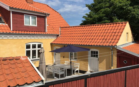 Reko - 500M from the Sea: Roof, Shade, Outdoor Furniture, Siding, Wood Stain, Yard, Balcony, Deck