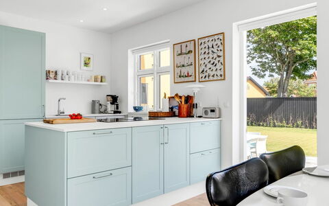 Hansiane - 500M from the Sea: Kitchen, Countertop, Kitchen Appliance, Cabinetry, Flooring, Interior Design, Major Appliance, Wood, Furniture, Floor