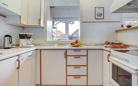 Hansiane - 500M from the Sea: Kitchen, Countertop, Kitchen Appliance, Interior Design, Wood, Cabinetry, Flooring, Major Appliance, Ceiling, Home