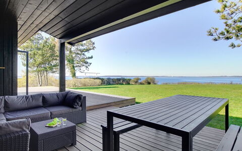Iadrik - 85M to the Fjord: Roof, House, Home, Cottage, Siding, Estate, Driveway, Garden Buildings, Yard, Shed