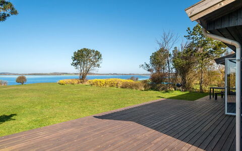 Iadrik - 85M to the Fjord: Roof, House, Home, Cottage, Siding, Estate, Driveway, Garden Buildings, Yard, Shed