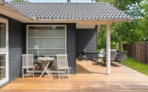Doritte - 125M from the Sea: House, Home, Door, Roof, Cottage, Estate, Garden, Shade, Siding, Yard