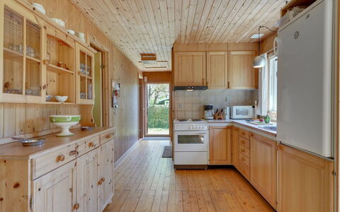 Hege - 450M from the Sea: Kitchen, Countertop, Cabinetry, Flooring, Wood, Interior Design, Kitchen Appliance, Ceiling, Furniture, Floor
