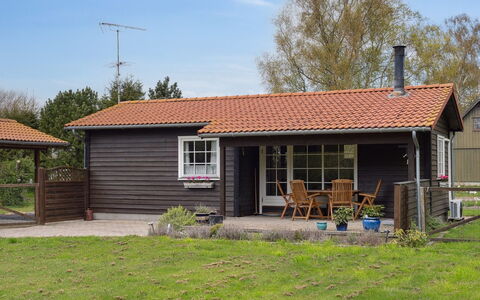Undis - 660M from the Sea: Cottage, House, Siding, Roof, Home, Door, Garden Buildings, Porch, Yard, Backyard