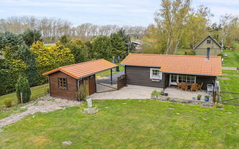 Undis - 660M from the Sea: Roof, House, Home, Cottage, Siding, Estate, Driveway, Garden Buildings, Yard, Shed
