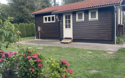 Undis - 660M from the Sea: Roof, House, Home, Cottage, Siding, Estate, Driveway, Garden Buildings, Yard, Shed