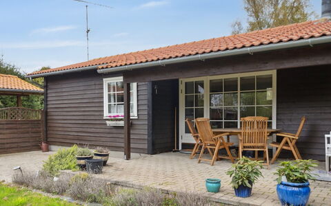 Undis - 660M from the Sea: Roof, House, Home, Cottage, Siding, Estate, Driveway, Garden Buildings, Yard, Shed