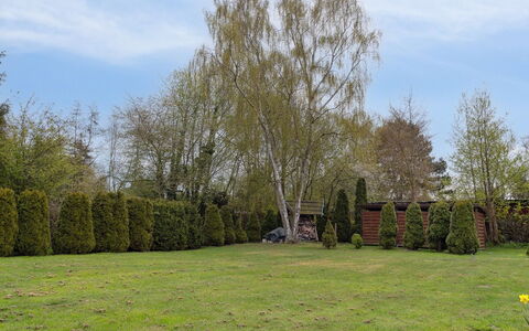 Undis - 660M from the Sea: Roof, House, Home, Cottage, Siding, Estate, Driveway, Garden Buildings, Yard, Shed
