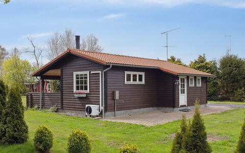 Undis - 660M from the Sea: Roof, House, Home, Cottage, Siding, Estate, Driveway, Garden Buildings, Yard, Shed