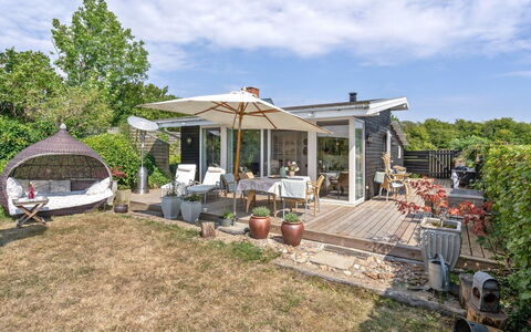 Daike - 25M from the Sea: Roof, Home, Siding, Cottage, Yard, Hardwood, Design, Garden Buildings, Wood Stain, Farmhouse