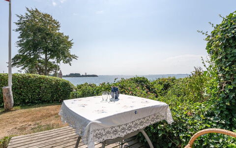 Daike - 25M from the Sea: Roof, Home, Siding, Cottage, Yard, Hardwood, Design, Garden Buildings, Wood Stain, Farmhouse