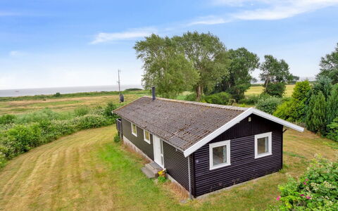 Bridgette - 100M from the Sea: Wood, Wood Stain, Plank, Hardwood, Cottage, Deck, Siding, Shade, Wood Flooring, Garden Buildings