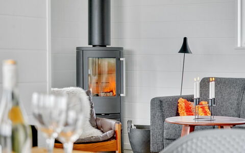 Klarin - 350M from the Sea: Flooring, Wood-Burning Stove, Living Room, Chair, Wood Flooring, Wood Stain, Hearth, Hardwood