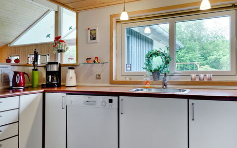Ulrikke - 12Km from the Sea: Kitchen, Countertop, Wood, Interior Design, Kitchen Appliance, Flooring, Ceiling, Furniture, Cabinetry, Lighting