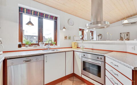 Rika - 525M to the Fjord: Flooring, Interior Design, Wood, Kitchen, Ceiling, Floor, Home, Countertop, Light Fixture, Lighting