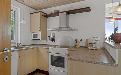 Simo - 250M from the Sea: Kitchen, Countertop, Flooring, Furniture, Interior Design, Kitchen Appliance, Wood, Floor, Cabinetry, Ceiling