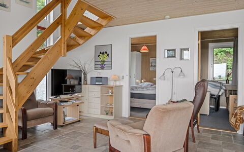 Simo - 250M from the Sea: Furniture, Flooring, Interior Design, Floor, Wood, Ceiling, Room, Chair, Wood Flooring, Living Room