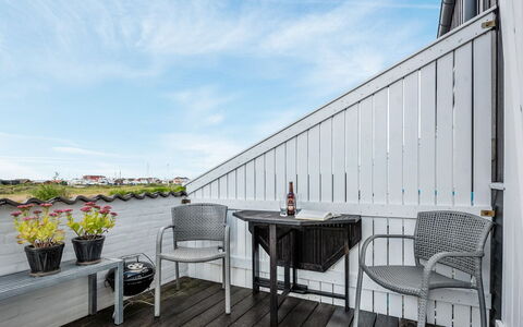 Tofan - 100M to the Fjord: Wood, Wood Flooring, Deck, Hardwood, Outdoor Furniture, Plank, Chair, Outdoor Table, Balcony, Shade