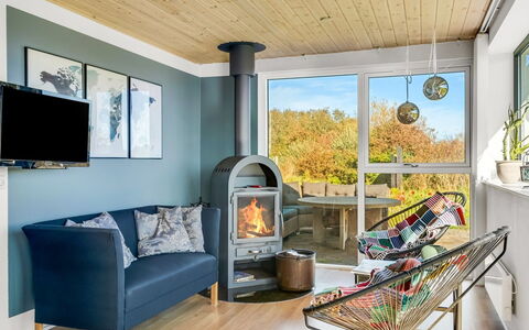Dunja - 200M to the Fjord: Furniture, Interior Design, Flooring, Wood, Floor, Chair, Ceiling, Lighting, Wood Flooring, Living Room