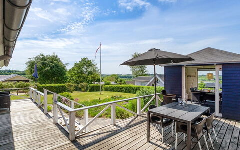 Edvia - 700M to the Fjord: Deck, Shade, Porch, Boardwalk, Hardwood, Walkway, Plank, Design, Outdoor Structure, Eco Hotel