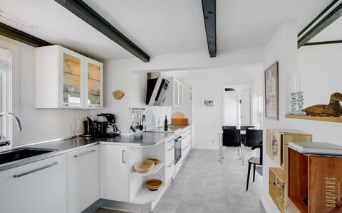 Edvia - 700M to the Fjord: Kitchen, Interior Design, Countertop, Flooring, Furniture, Ceiling, Cabinetry, Kitchen Appliance, Floor, Light Fixture