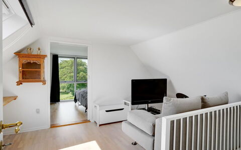 Edvia - 700M to the Fjord: Furniture, Interior Design, Wood, Flooring, Ceiling, Floor, Room, Home, Couch, Living Room