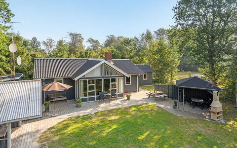 Razmo - 300M from the Sea: Roof, House, Home, Cottage, Siding, Estate, Driveway, Garden Buildings, Yard, Shed