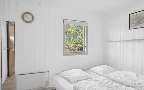 Tarja - 150M from the Sea: Wall, Wood, Floor, Flooring, Bedroom, Home, Ceiling, Door, Bed, Plank