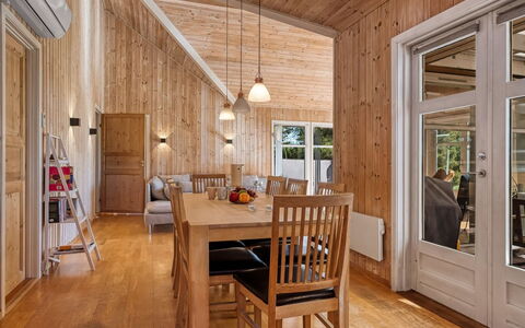 Annestine - 200M from the Sea: Flooring, Interior Design, Furniture, Wood, Wood Flooring, Ceiling, Floor, Light Fixture, Room, Dining Room