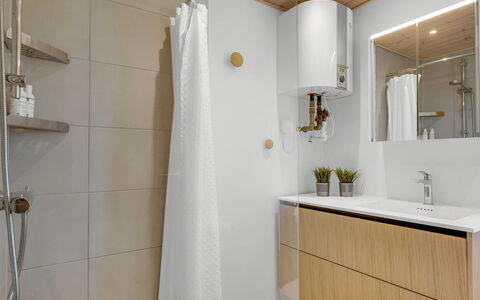 Aatu - 360M from the Sea: Flooring, Interior Design, Wall, Plumbing Fixture, Floor, Wood, Bathroom Sink, Bathroom Cabinet, Bathroom, Sink
