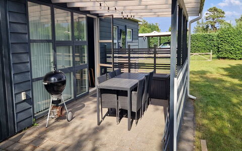 Guthrik - 900M from the Sea: Furniture, Wood, Outdoor Furniture, Outdoor Table, Shade, Porch, Chair, Outdoor Structure, Hardwood, Wood Stain