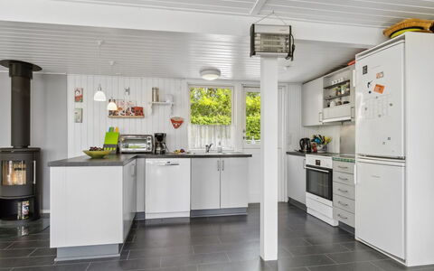 Guthrik - 900M from the Sea: Kitchen, Flooring, Countertop, Major Appliance, Kitchen Appliance, Interior Design, Ceiling, Wood, Floor, Home Appliance