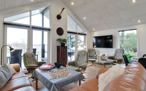 Cholena - 700M from the Sea: Furniture, Wood, Ceiling, Couch, Interior Design, Living Room, Home, Chair, Light Fixture