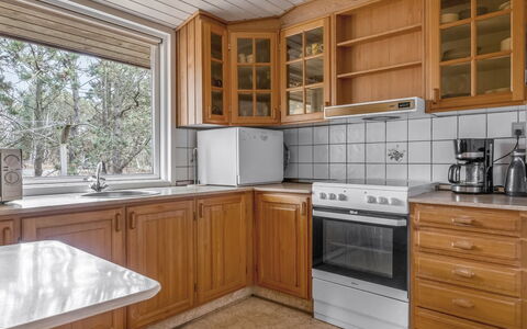 Asmara - 200M from the Sea: Kitchen, Cabinetry, Flooring, Wood, Kitchen Appliance, Countertop, Interior Design, Major Appliance, Floor, Ceiling