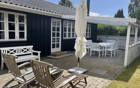 Skrolan - 200M from the Sea: Outdoor Furniture, Furniture, Home, Outdoor Table, Roof, Shade, Chair, Porch, Door, Patio