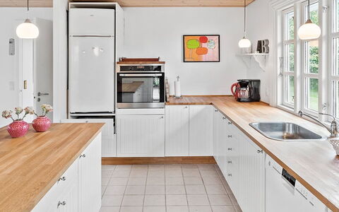 Skrolan - 200M from the Sea: Kitchen, Countertop, Kitchen Appliance, Flooring, Interior Design, Cabinetry, Wood, Major Appliance, Floor, Furniture